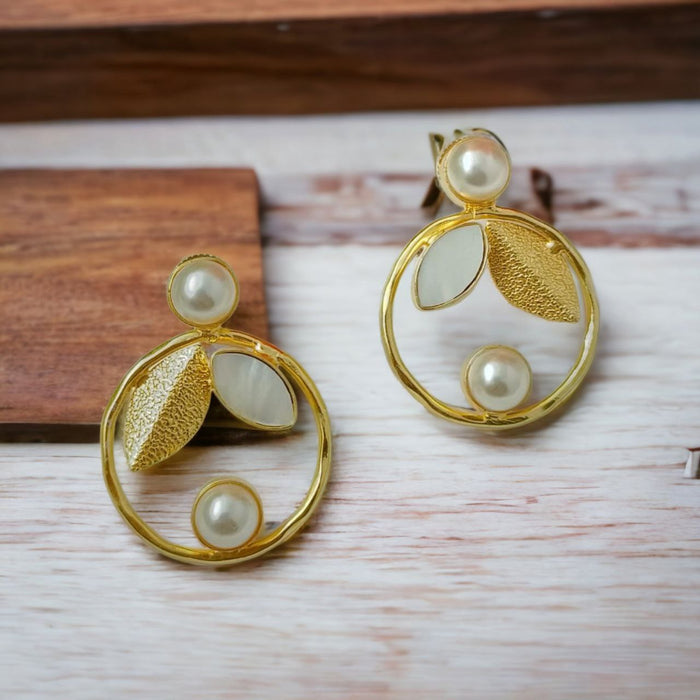 Pearl Elegance circular golden earring with graceful leaf and white stone accent